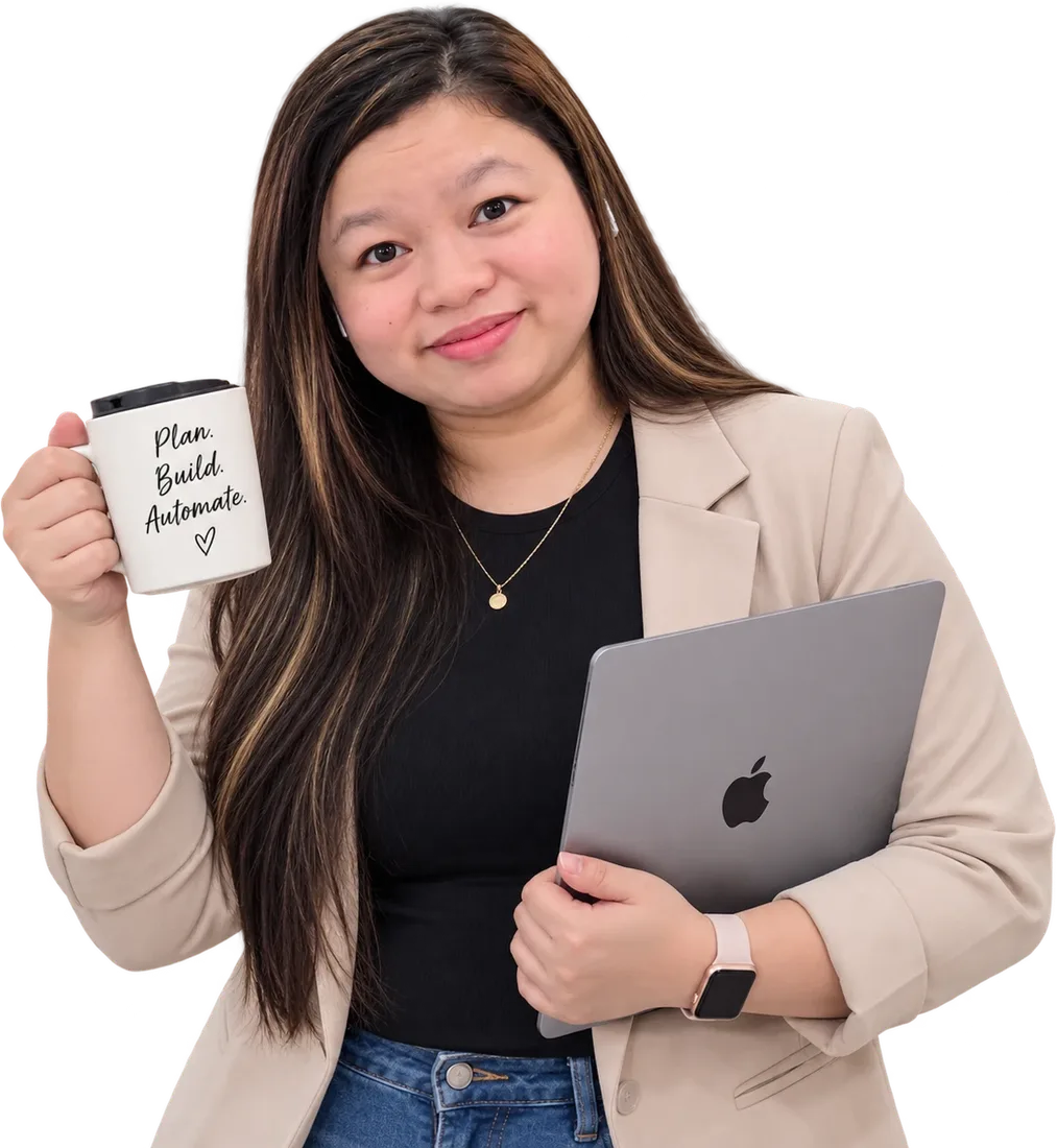 Lucia Anilao smiling, holding a 'Plan. Build. Automate.' mug and a MacBook